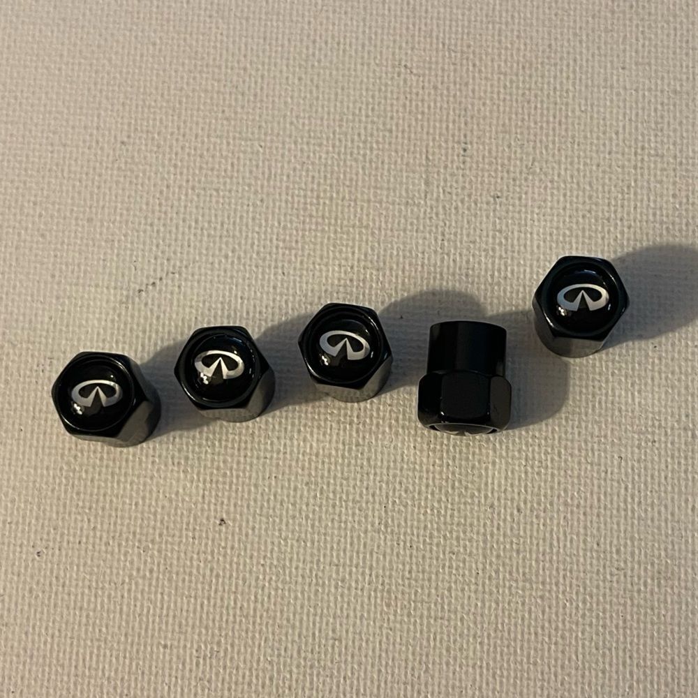 Infinity valve Stem caps in black set of 5 NWT